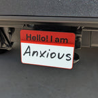 Hello, I am Anxious Name Tag Trailer Hitch Cover